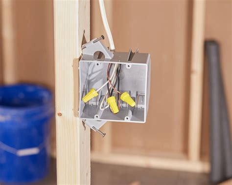 attaching electrical boxes to metal studs|existing construction electrical box.